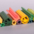 LARGE COLLECTION OF UNCUT BAKELITE OR CATALIN RODS, 1930-1950s