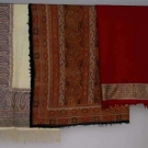 THREE PRINTED PAISLEY SHAWLS, MID 19TH C