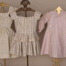 THREE CHILDREN'S CALICO DRESSES, 1850-1860