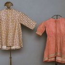 TWO TODDLER'S CALICO DRESSES, 1870s