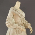 GREEN SILK BROCADE PARTY DRESS, c. 1840