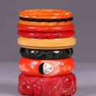 TEN CARVED BAKELITE BANGLES, AMERICA, 1930-MODERN