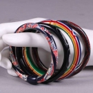 TWELVE LEA STEIN CELLULOID BRACELETS, PARIS