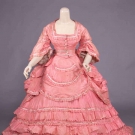 FOUR PIECE PINK SILK TAFFETA BALL GOWN, c. 1872