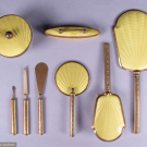 EIGHT PIECE BRASS DRESSING SET, 1930s