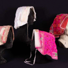 FOUR EMBROIDERED FOLK BONNETS, SLOVAKIA, LATE 19TH-EARLY 20TH C