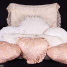 NINE BOUDOIR OR NURSERY PILLOWS, 1900-1930