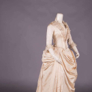 CREAM SILK OTTOMAN WEDDING GOWN, c. 1885