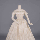CREAM PATTERNED SILK GOWN, c. 1850