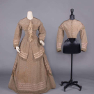WINTER DAY DRESS WITH ALTERNATE BODICE, LATE 1860s