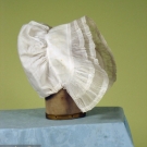 LADY'S WHITE LINEN CAP, 1820-1835