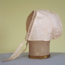 LADY'S WHITE COTTON CAP, MID 19th C