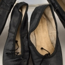 CHILD'S BLACK BALLET SLIPPERS, ENGLAND, 20th C