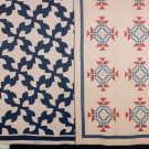 TWO HAND STITCHED COTTON PIECEWORK QUILTS, 1890s