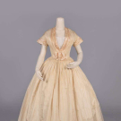 CREAM SHOT SILK EVENING GOWN, 1840s